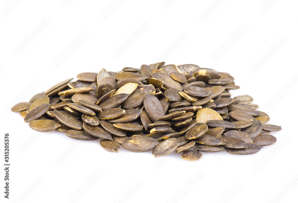 Pumpkin seeds isolated on a white background, close up Pumpkin seeds isolated on a white background, close up