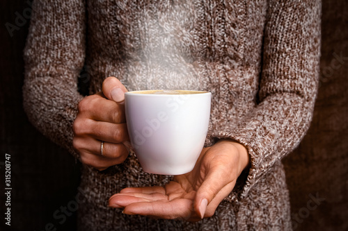 female hands and coffee