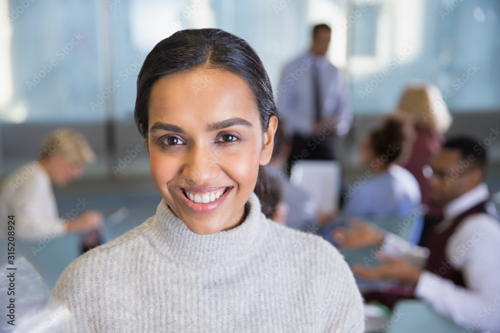 Portrait smiling businesswoman in conference room meeting Portrait smiling businesswoman in conference room meeting