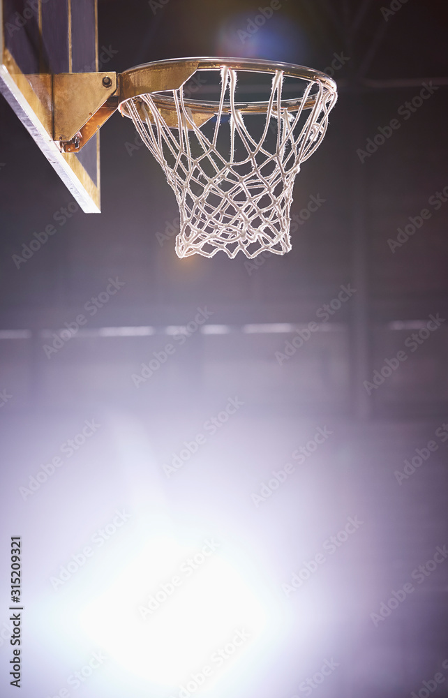 Lens flare around brightly lit basketball hoop Lens flare around brightly lit basketball hoop