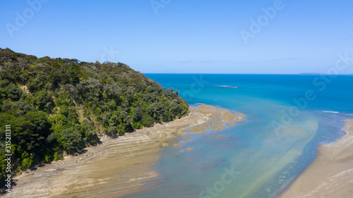 Aerial View from the Beach, Ocean, Green Trees of Wenderholm Regional Park in New Zealand - Auckland Area © Rodrigo