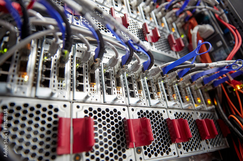 Close up server panels and network connection plug