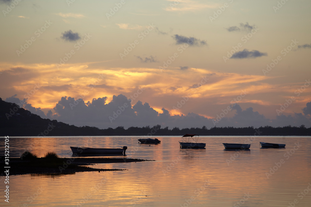 Little harbour at sunset in Le Morne Brabant, Mauritius