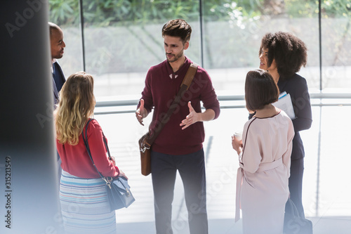 Business people talking in office photo