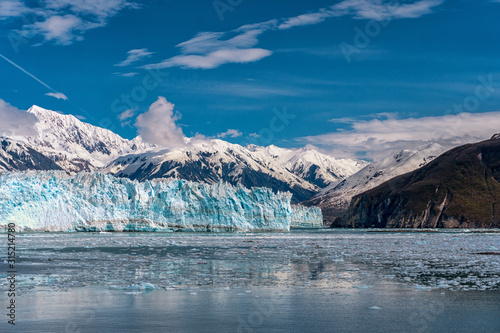 Amazing view on Hubbard Glacier. Snowy mountain peaks, wildlife, icebergs, Beautiful blue face of the glacier. This is Alaska cruise and ship was in Juneau, Ketchikan and Skagway.  © shorex.koss