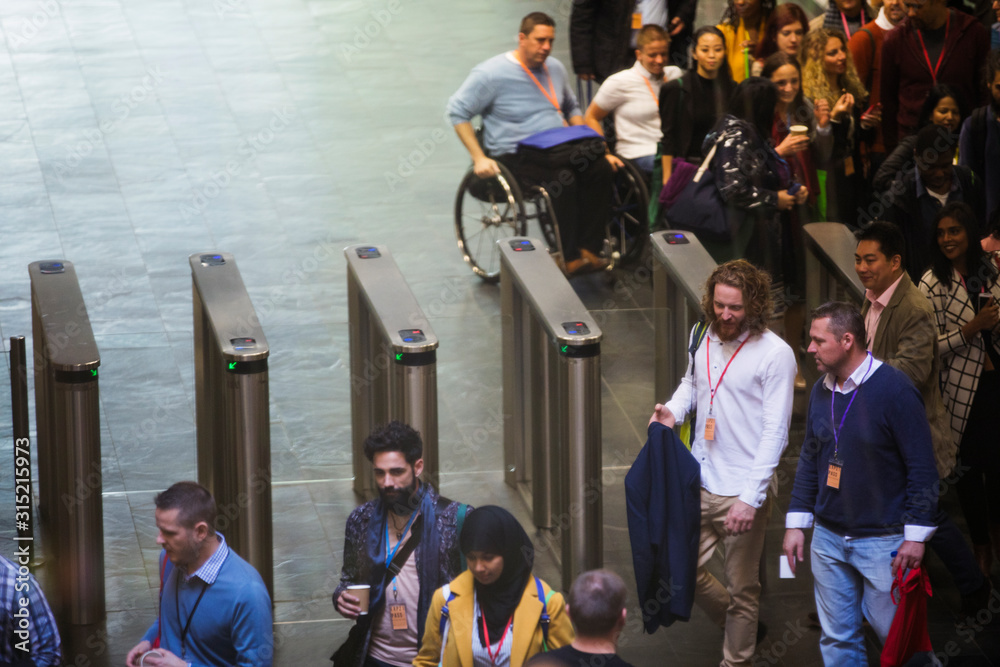 © Sam Edwards/Caia Image - Business people arriving at conference © Sam Edwards/Caia Image - Business people arriving at conference