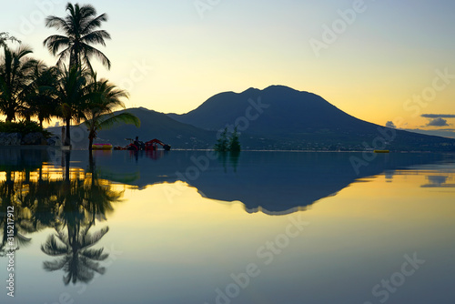 Sunset view of the Nevis Peak volcano across the water from St Kitts