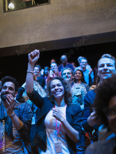 Enthusiastic audience cheering