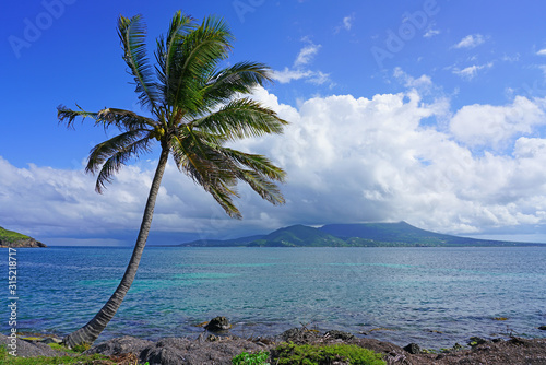 Day view of the Nevis Peak volcano across the water from St Kitts