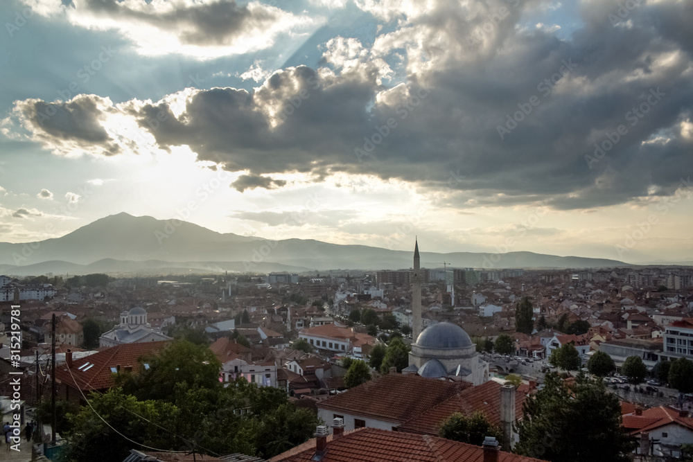 Panorama of the city center of Prizren, Kosovo, with minaret ofthe Sinan Pasha Mosque at sunset. Prizren is the second biggest city of Kosovo and a major ottoman architecture and cultural landmark
