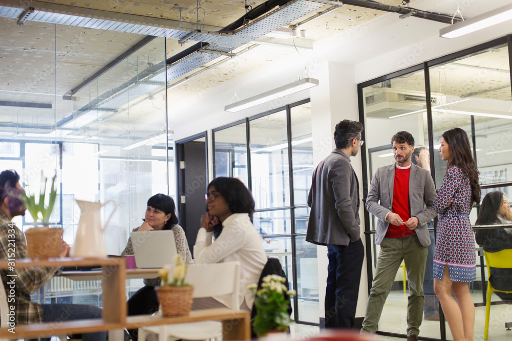 Business people talking and working in office Business people talking and working in office