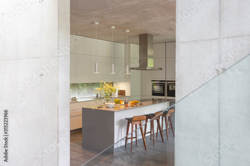 Modern white kitchen with island photo