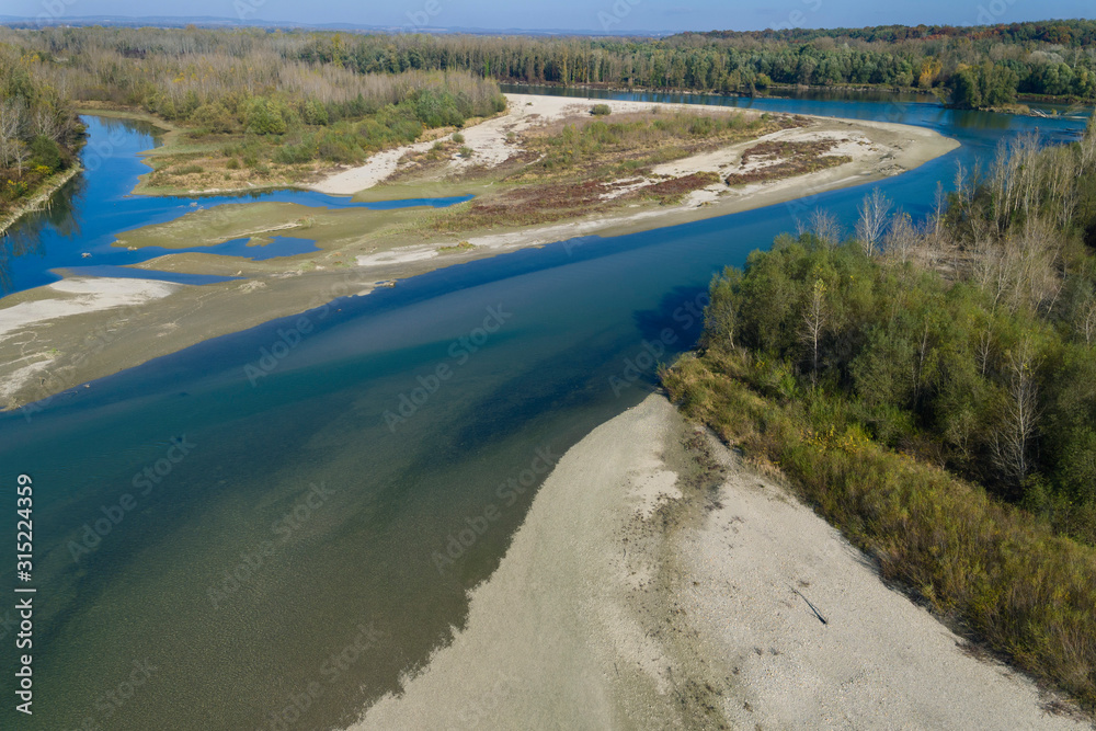 Aerial view of the confluence of Mura and Drava rivers in autumn
