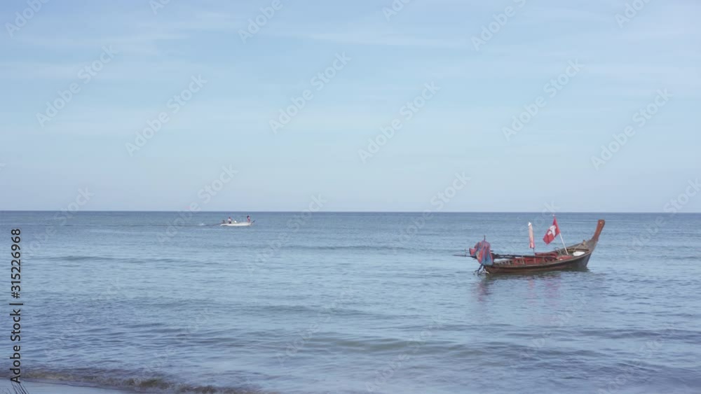 Fishing boat rest in calm waters