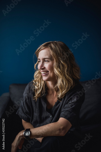 Portrait smiling, confident woman looking away