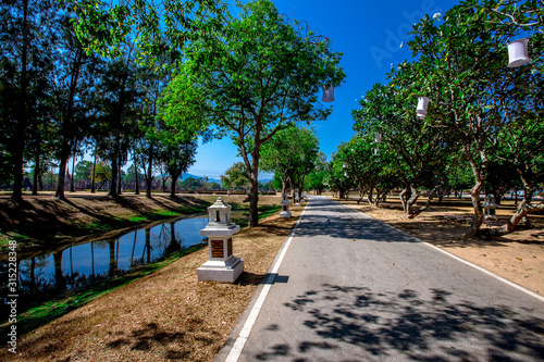 Background, the landmark of the Buddhist tourist attraction in Sukhothai Historical Park, tourists all over the world come to see the beauty always in Thailand.