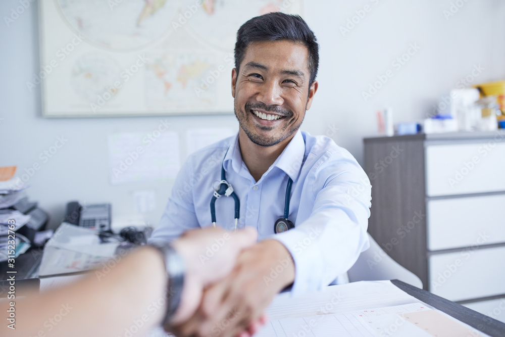 Point of view happy doctor shaking hands with patient Point of view happy doctor shaking hands with patient