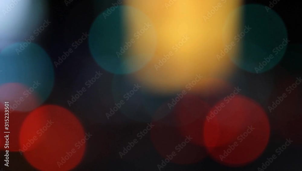 Heavily blurred city traffic with red lights of cars moving and electronic signs adding additional color and motion to the video. Heavily blurred city traffic with red lights of cars moving and electronic signs adding additional color and motion to the video.