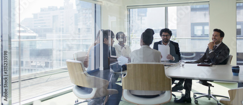 Business people talking in conference room meeting