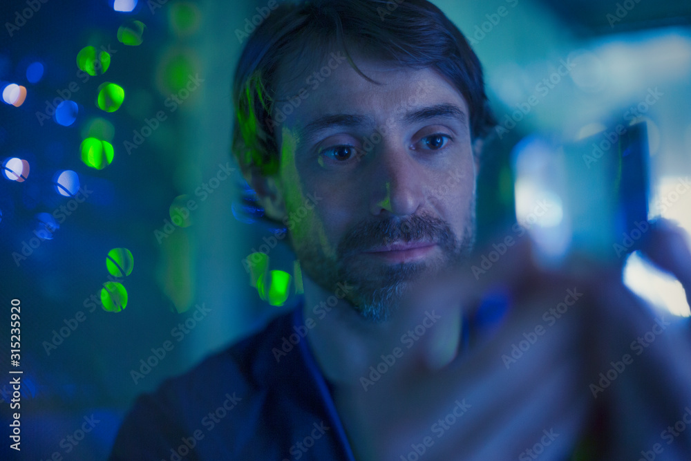 Server room technician examining part Server room technician examining part