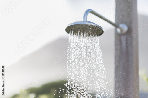 Water falling from outdoor rain shower head