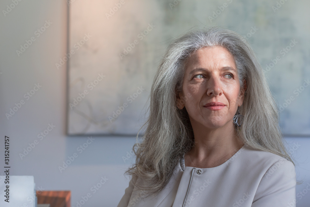 Serious, pensive, businesswoman looking away Serious, pensive, businesswoman looking away