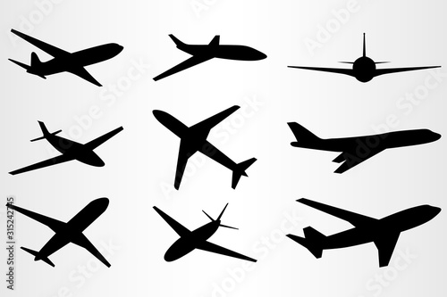 Set of nine stylized silhouettes of flying planes. Set for travel needs.