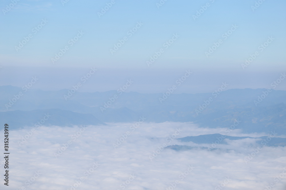 clouds and aerial view of the mountains