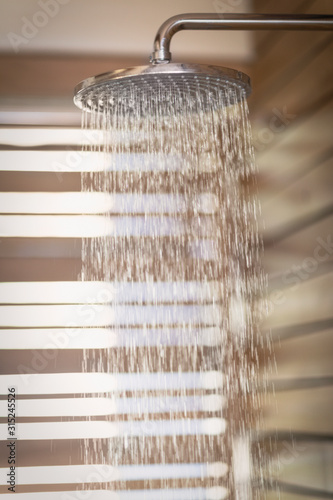 Water falling from rain shower head