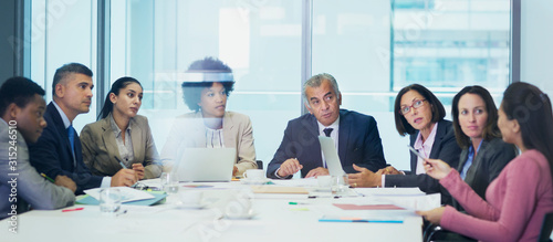 Business people talking in conference room meeting