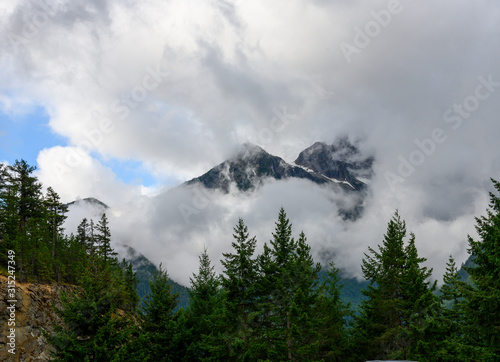Thick Clouds Hover Around Mountains in Washington