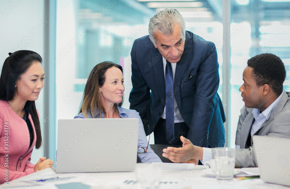 Business people talking in conference room meeting Business people talking in conference room meeting