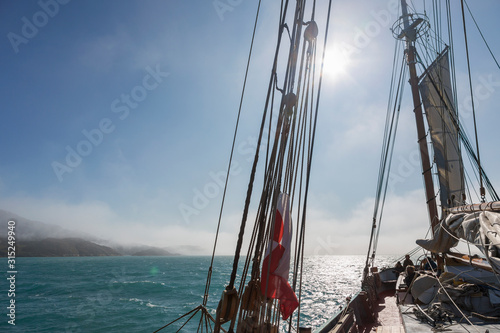 Sailboat rigging on sunny Atlantic Ocean Greenland photo