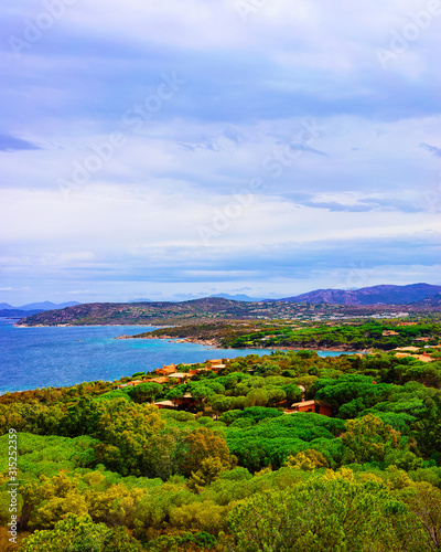 Landscape of Capo Coda Cavallo seen from San Teodoro in the Mediterranean sea in Olbia-Tempio province, Sardinia island, Italy in summer. Scenery at Tavolara Island. Mixed media. © Roman Babakin