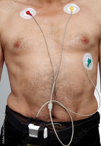 Man with ecg electrodes