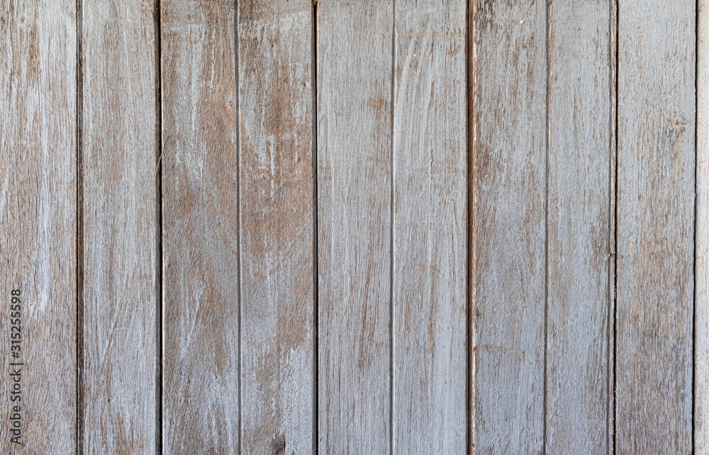 The texture of the old wooden wall, vertical pattern