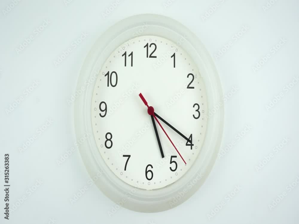 Closeup White watch time 05.20 am or pm, the second hand moves slowly, Time concept. Closeup White watch time 05.20 am or pm, the second hand moves slowly, Time concept.