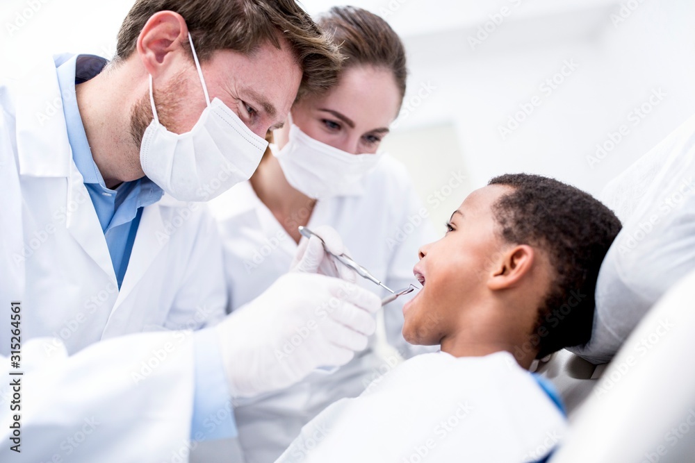 Boy having oral check-up Boy having oral check-up