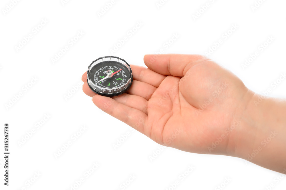 Man's hand holding a Compass on the white background. Man's hand holding a Compass on the white background.