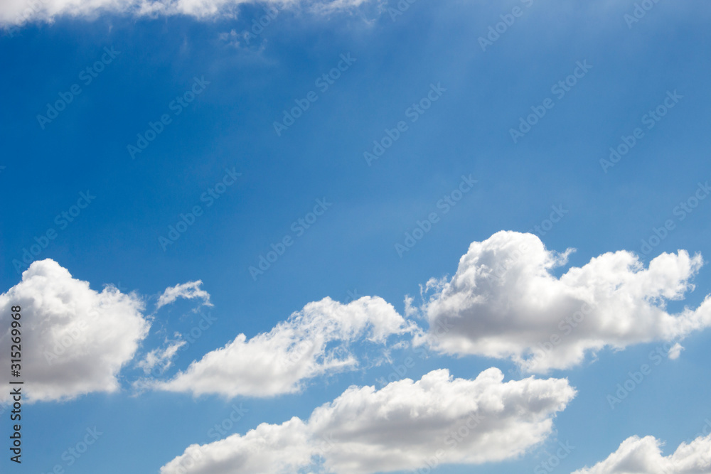 Bright blue sky with white clouds for background or wallpapers Bright blue sky with white clouds for background or wallpapers