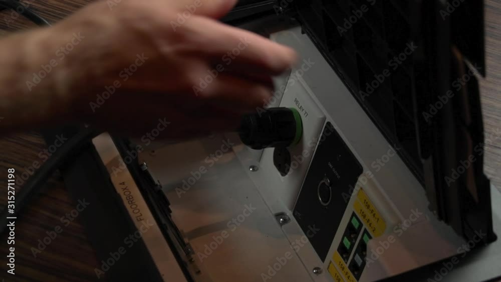 Plugging power into floor box Plugging power into floor box