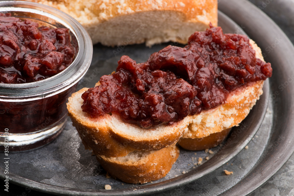 Sweet bread (challah) with cherry jam