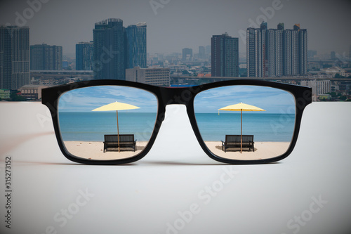 Work-Life-Balance: An abstract illustration of the modern way of life that must be considered in the balance of time and work.By reflecting of the travel destination image through the lens of glasses 