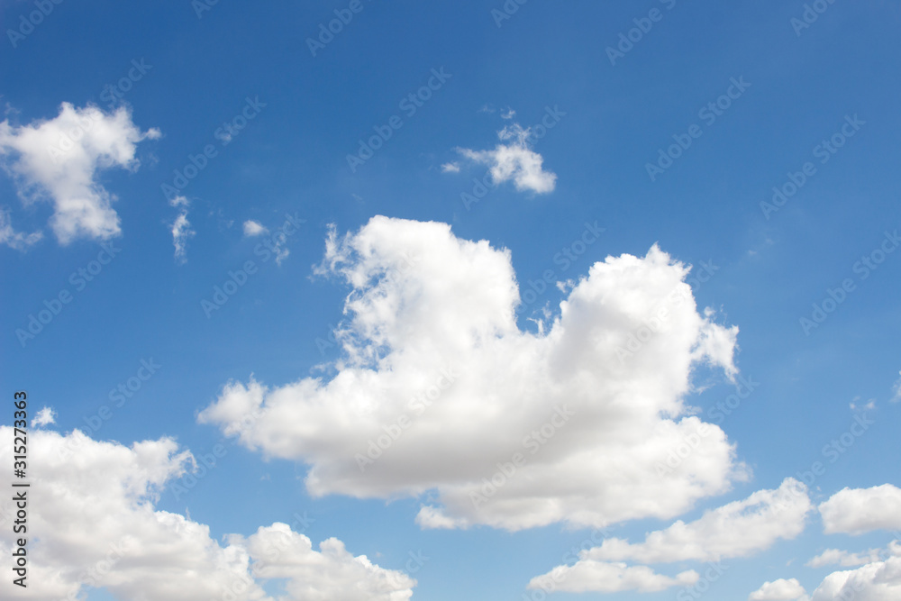 Bright blue sky with white clouds for background or wallpapers Bright blue sky with white clouds for background or wallpapers