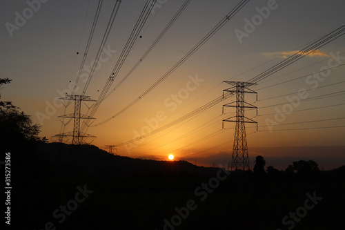 Nature and industrial innovation view  while sunset