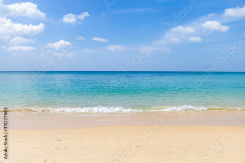 Peceful beach with blue sky and blue sea, relaxing by the beach, holiday and vacation to Tropical island in Southern Thailand, summer outdoor day light © sirirak