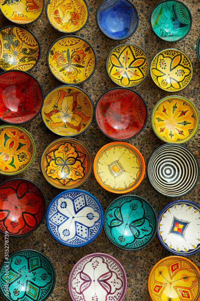 assortment of colorful  tajine plate sold in the médina of Marrakech -Morocco 