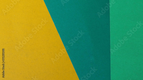 Yellow and green pastel color background, flat geometric paper
