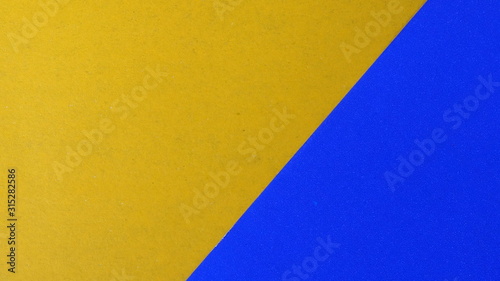 Yellow and blue pastel color background paper flat geometric