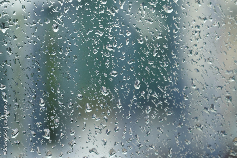 Blurred Water Droplets On Glass Mirror Suitable For Background Blurred Water Droplets On Glass Mirror Suitable For Background